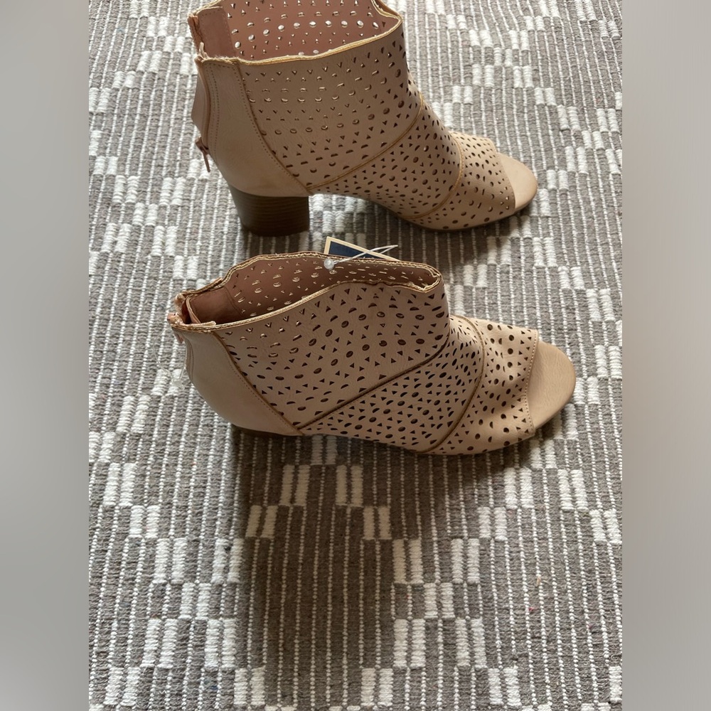Blush pink perforated peep toe wedges